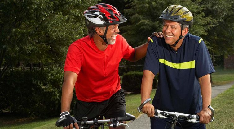 Two bike buddies laughing 